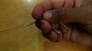 How to attach a fishing hook to a steel leader. 