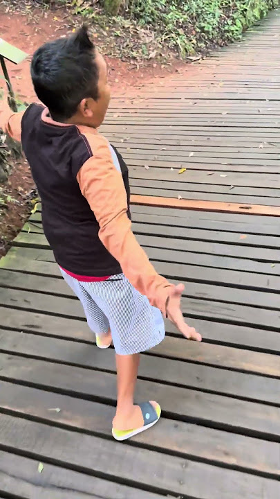 Child runs in fear of jaguar