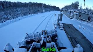 Cleaning up after a Swedish snowstorm Caterpillar 972M XE Wheel Loader plow snow