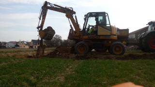 Loading Fendt 826 with Hydrema M 800
