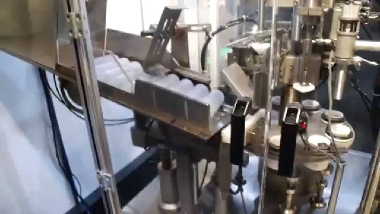 LH Packaging flexible tube machine YouTube