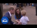 Prince George is very happy with his sticker on trip to Fairford - Daily Mail