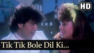 Tik Tik Bole Dil Ki Ghadi - Gair Kaanooni - Sridevi - Govinda - Bappi Lahiri - Govinda's Dance Song Resimi