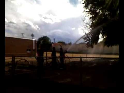 Denver Denison Montessori School playground fire - spraying tree