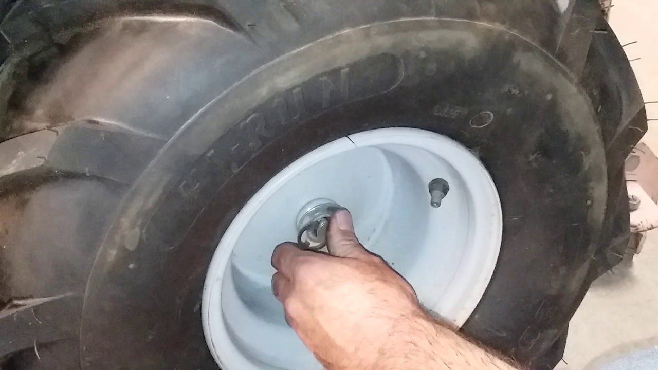 Installing the wheels/tires on a lawn tractor YouTube