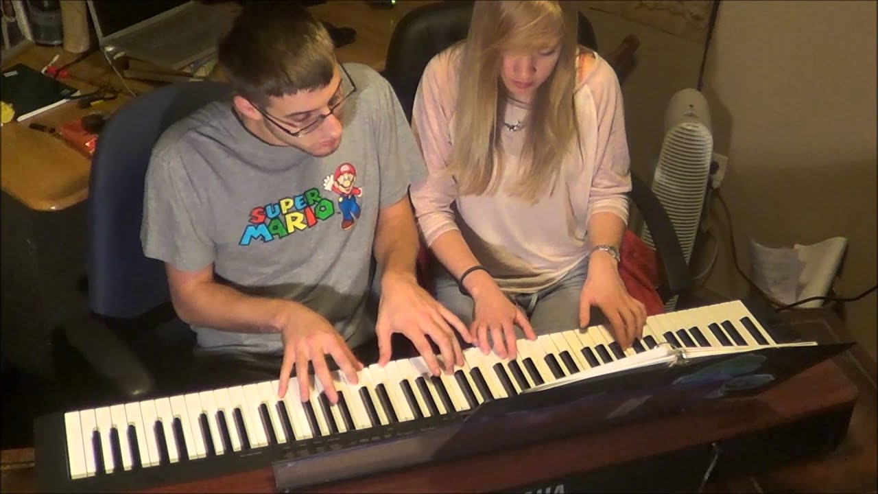 Lara and Kyle play Bach suite no. 2 (piano duet)