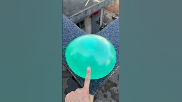 Experiment: Will a water balloon explode if it rolls down a tall building? 💥🎈#shorts