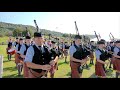 Oban High School Pipe Band march on playing Loch Ruan during 2021 Oban Games Argyllshire Gathering