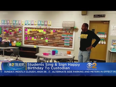 class-signs-'happy-birthday'-for-deaf-custodian