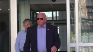 Frederick Sheriff Chuck Jenkins leaves Federal Court after hearing on gun scheme charges