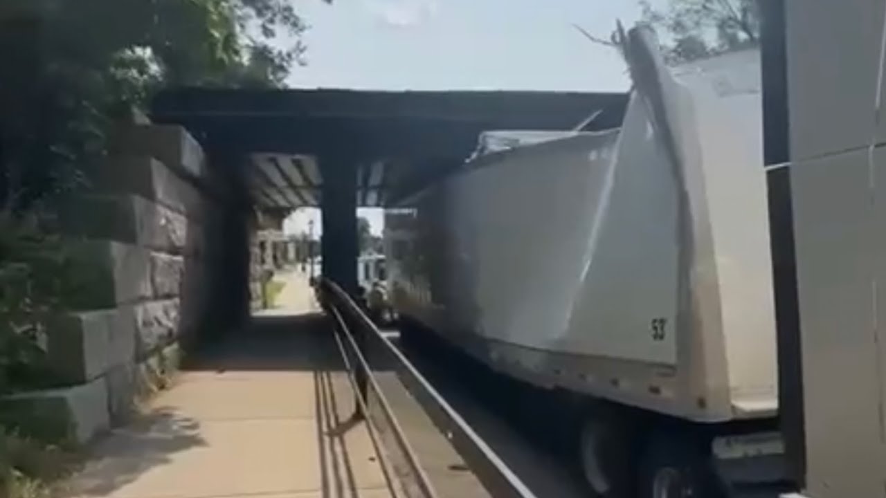 Truck driver slams into Low Bridge at 60 mi an hour - YouTube