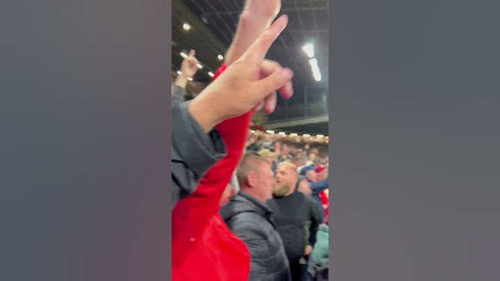 MADNESS AT OLD TRAFFORD... Man United fans celebrate an unbelievable comeback vs Lyon..