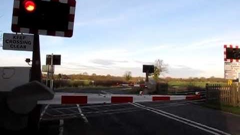 Cross Country Class 170 DMU at level crossing