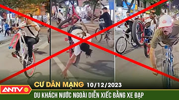 Phản cảm hình ảnh nhiều du khách nước ngoài "diễn xiếc” bằng xe đạp trên đường phố Hà Nội | CDM