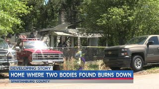 Spartanburg County home where two bodies were found earlier this month has now burned to the ground.