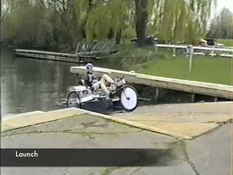 As seen on TV and in the national press... This amphibious cycle was designed and built by seven engineering students at the University of Southampton, England in 2008. It is powered on water by a paddle wheel. Group Members: Anthony Chesshire David Edwards Simon Halford Jo Hutchinson Jack Marriott Andrew Webster Simon Wiles Video compiled by David Edwards Images... farm4.static.flickr.com farm4.static.flickr.com Project supervisors... Dr A. Bhaskar Dr S. Syngellakis Dr K. Djidjelli Music: Enya - Sail Away -