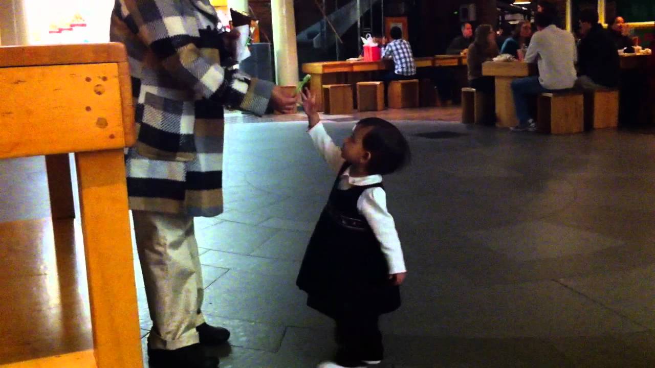 Meethi enjoying her ice cream Quincy market YouTube