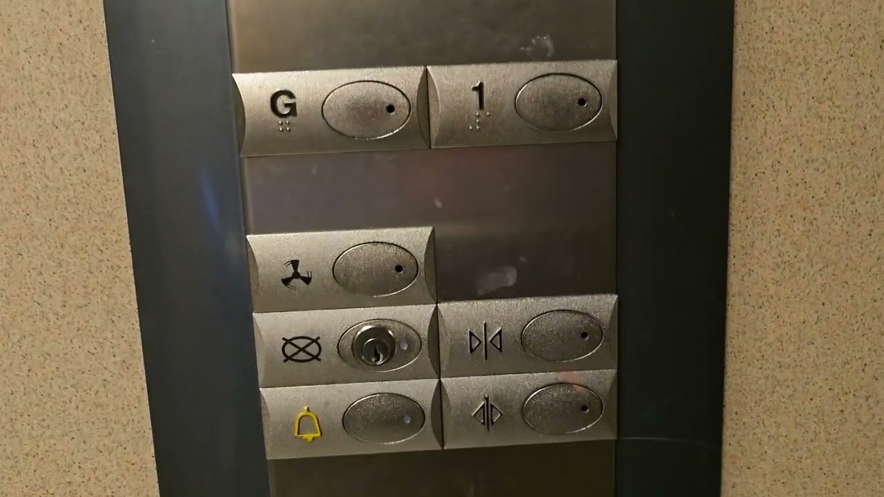 Nicer older Orona and a GeN2 lifts @ Tesco Extra in Crawley