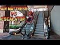 RIDING AIR MATTRESS DOWN MALL ESCALATOR!