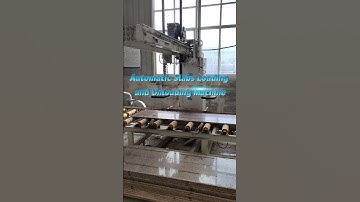 Automatic slabs loading and unloading machine