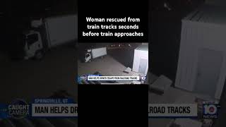 Woman rescued from train tracks seconds before train approaches #caughtoncamera #utah