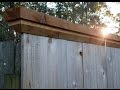 Trim Your fence with cap board..