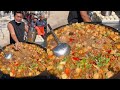 A Chinese Guy Cooked Free Douban vermicelli for the elders on the Street in a Downtown Village