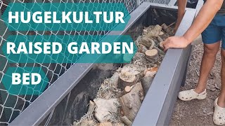 Hugelkultur Filling Raised Garden Bed