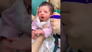 Cute Baby Girl Getting Ear Piercing