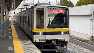 東武20000系列20400型20410番台21413編成が回送電車として南栗橋駅1番線に到着停車するシーン（2024.1.11.9:32）