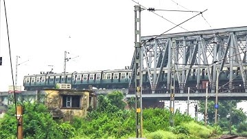 First EMU Local train was covered by Silghat Exp but next EMU & Hool Exp run through bridge lonely