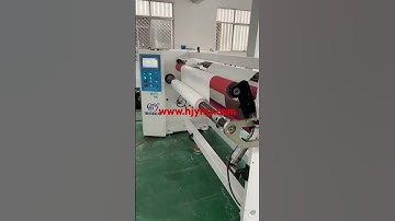 Tape rewinding machine and cutting machine