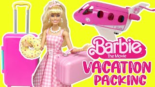 barbie the movie doll packing for vacation