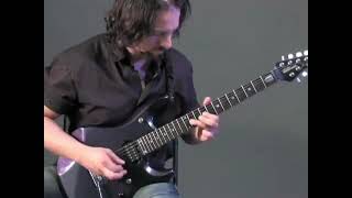 John Petrucci plays the "Under a Glass Moon" solo