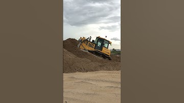 The best heavy machine shantui bulldozer pushing sand it’s stronger on construction.