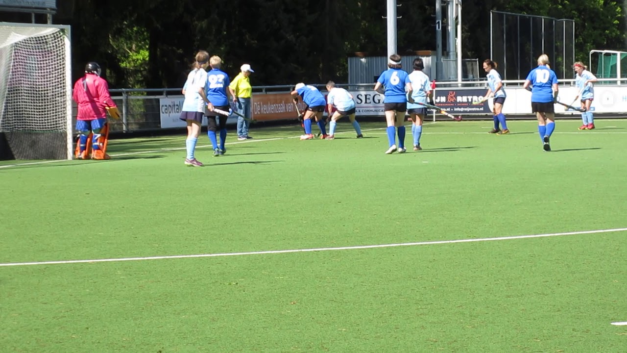 O65s team defending a short corner