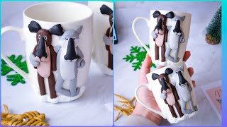 Polymer clay decor cartoon dog and wolf on a cup. Polymer clay tutorial sculpting decor