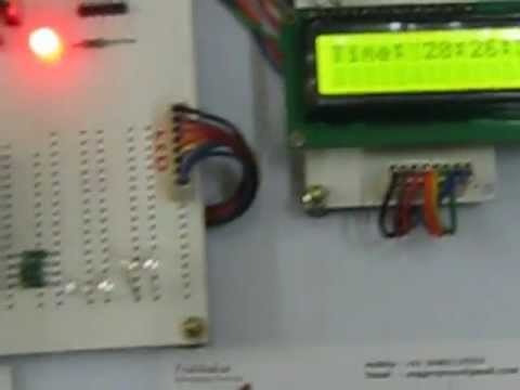 Real time clock timer based streetlight controlling with day light power saving using LDR