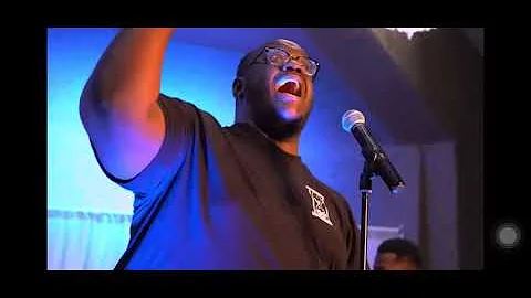 Austin Blackmon singing at New Zion Temple
