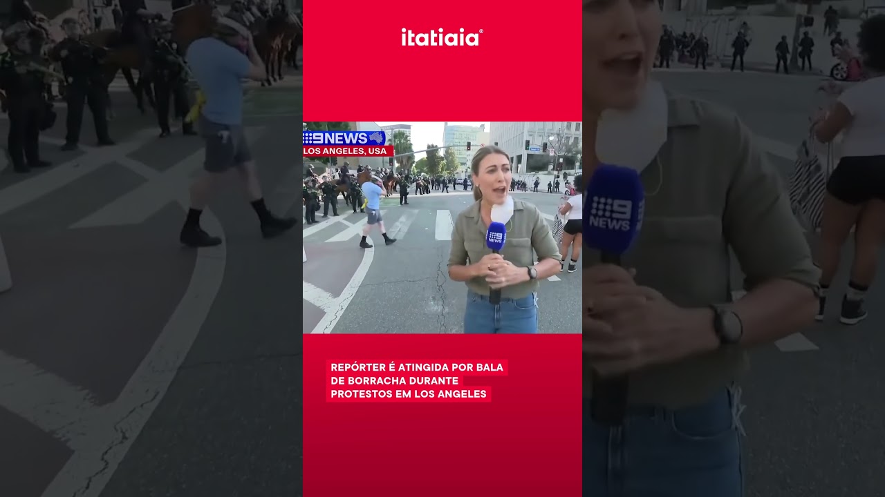 REP&Oacute;RTER &Eacute; ATINGIDA POR BALADE BORRACHA DURANTE PROTESTOS EM LOS ANGELES