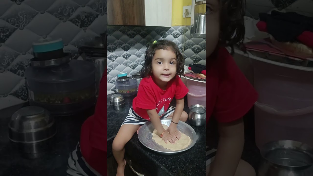 Helping ma in kitchen