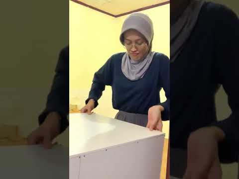Video: Kami membeli lemari berlaci putih