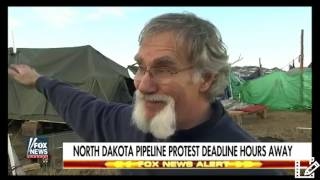 Army Corps Moves in to SHut Down DAPL Camp Activists Start Fires