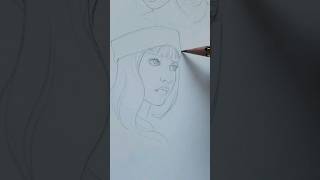 sketching a portrait on my Moleskine 5