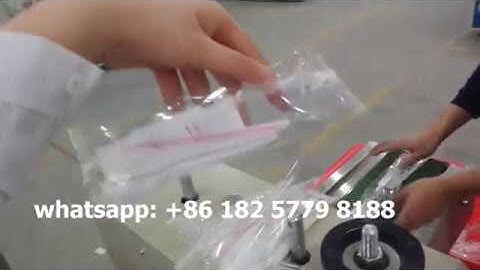 Automatic horizontal napkin knife-fork-spoon-cutlery flow wrap packing machine