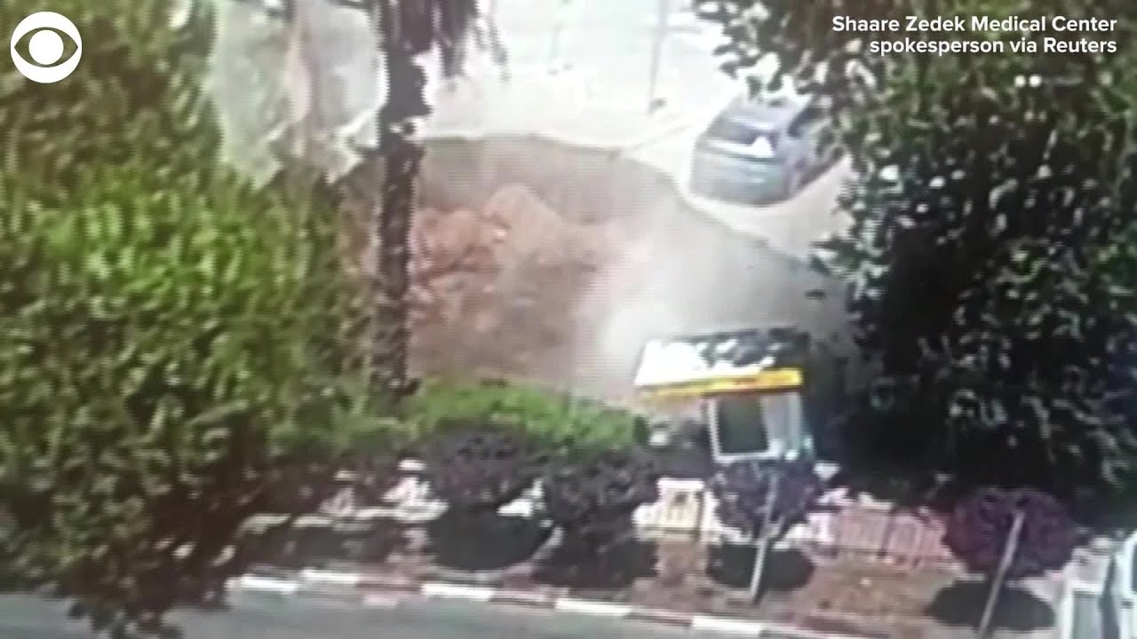 WEB EXTRA: Sinkhole Swallows Car - YouTube