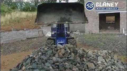 Transporting Rocks- Compact Wheeled Loader L1 10-27