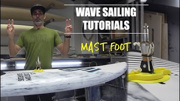 Where to place the mast foot on a wave board. ¿To the front or to the back?