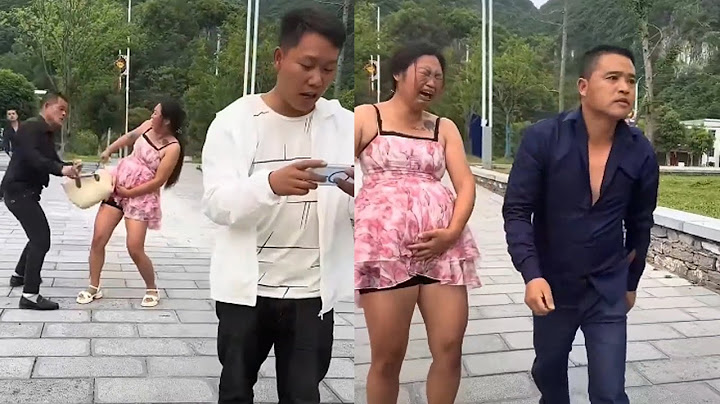 老公只顾玩手机，老婆的包被别人抢走了都还不知道，像这样的男人该打吗#传递正能量
