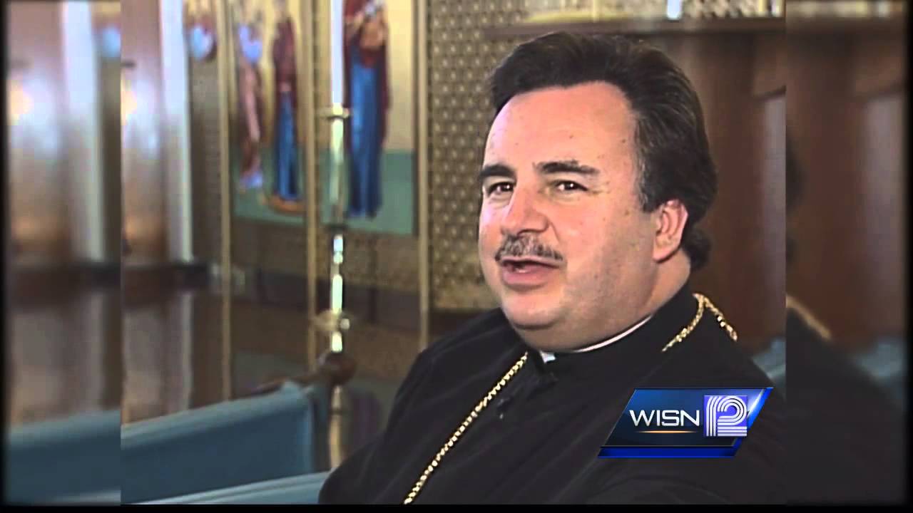 Father James Dokos a no-show in court again Monday